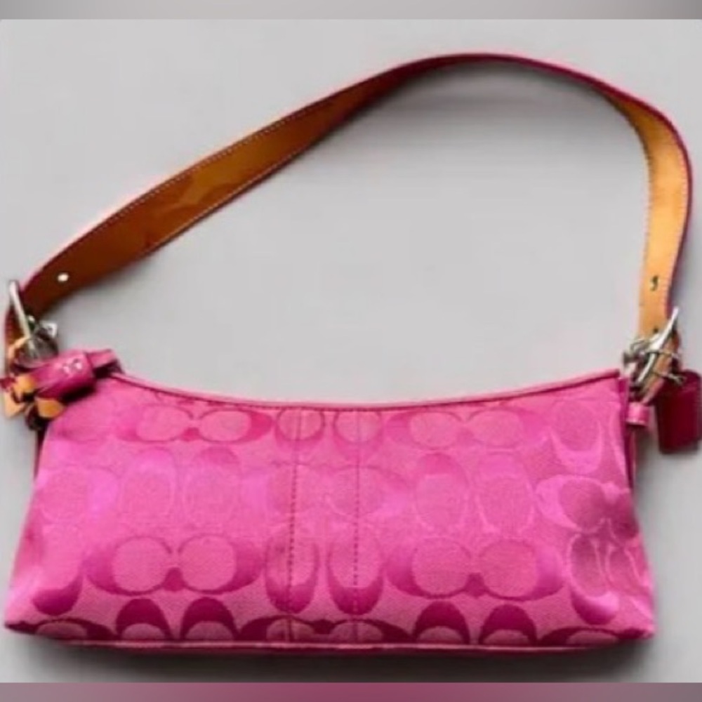 Pink Coach clutch shoulder purse.